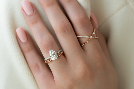 What is the best wedding band for a pear shaped engagement ring?