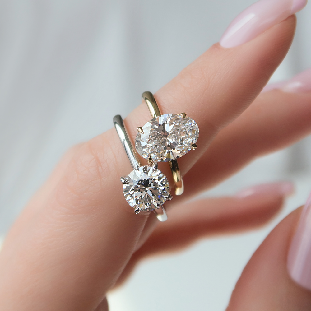 Choosing between round vs oval diamond? See how both look on designs like The Kamellie and Low Profile Kamellie.