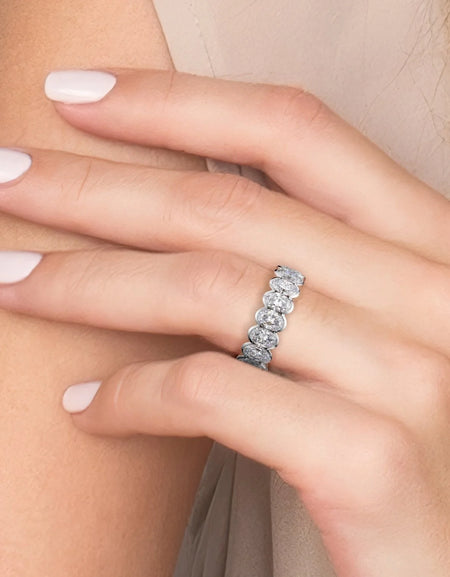 4.5ct Oval Half Bezel Eternity WG