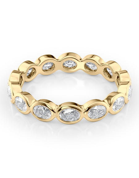 1.4ct East West Oval Bezel Eternity YG
