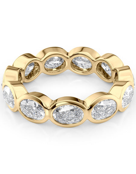 3.3ct East West Oval Bezel Eternity YG