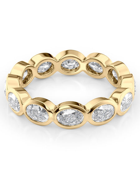 2.4ct East West Oval Bezel Eternity YG