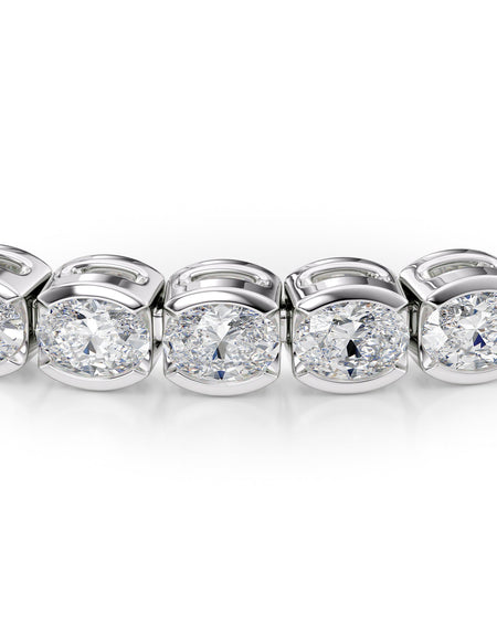 East West Half Bezel Oval Tennis Bracelet 6.0tcw WG