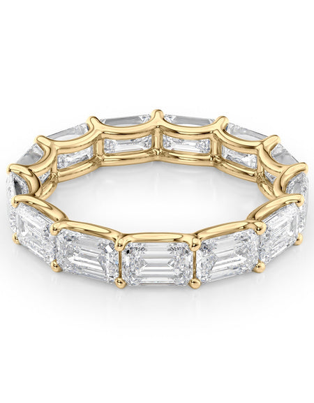 5ct East West Emerald U Prong Eternity YG