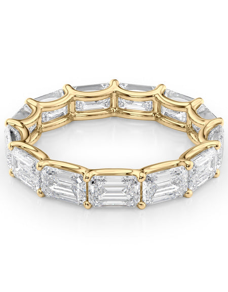 5ct East West Emerald U Prong Eternity YG